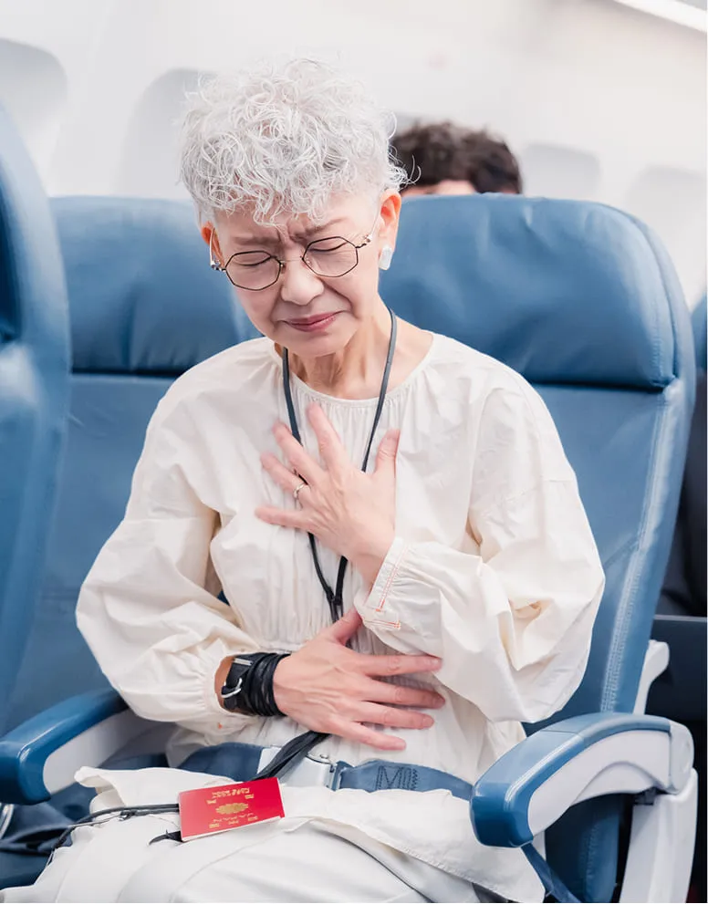 Senior feeling pain in airplane