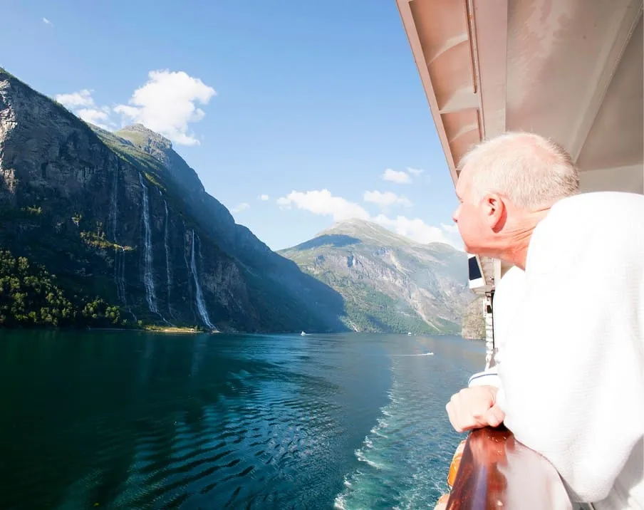 Senior travelling in boat